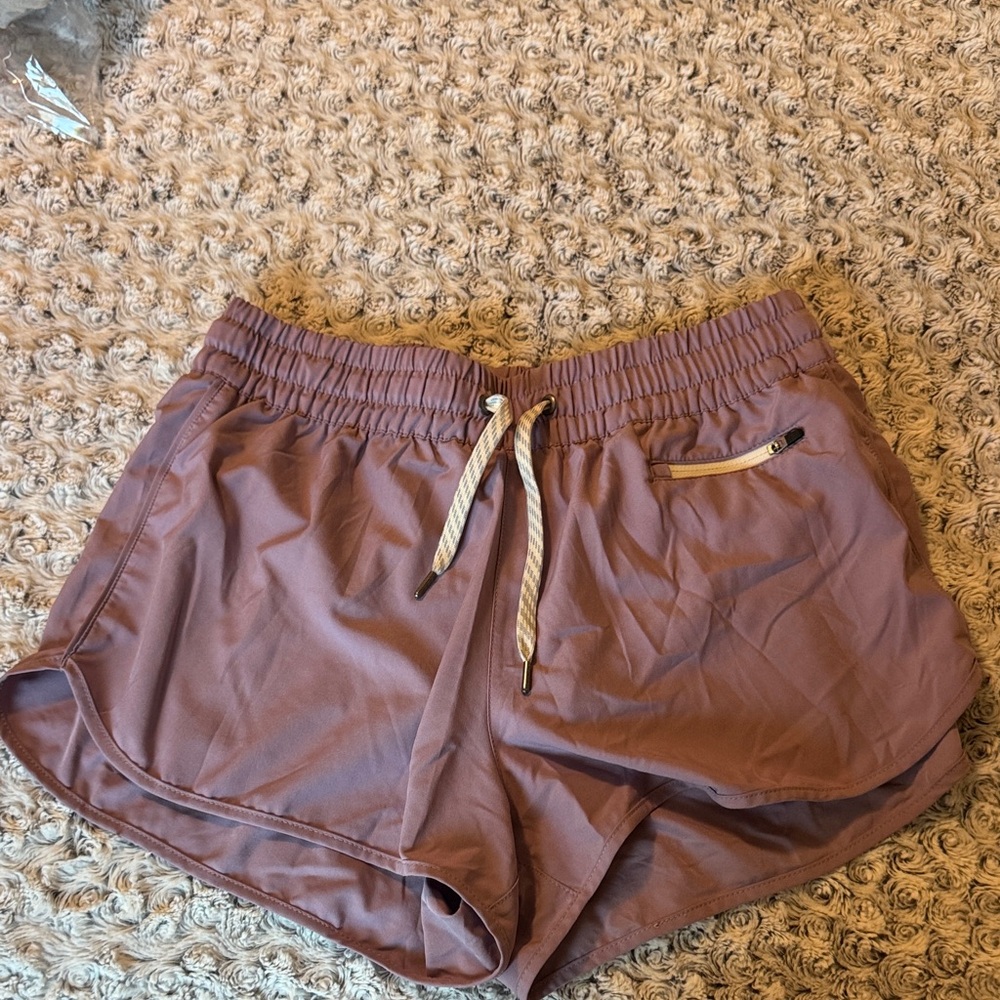 Vuori Women's Athletic Shorts in Mauve